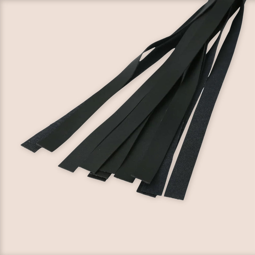 Sex & Mischief Faux Leather Flogger | vinyl