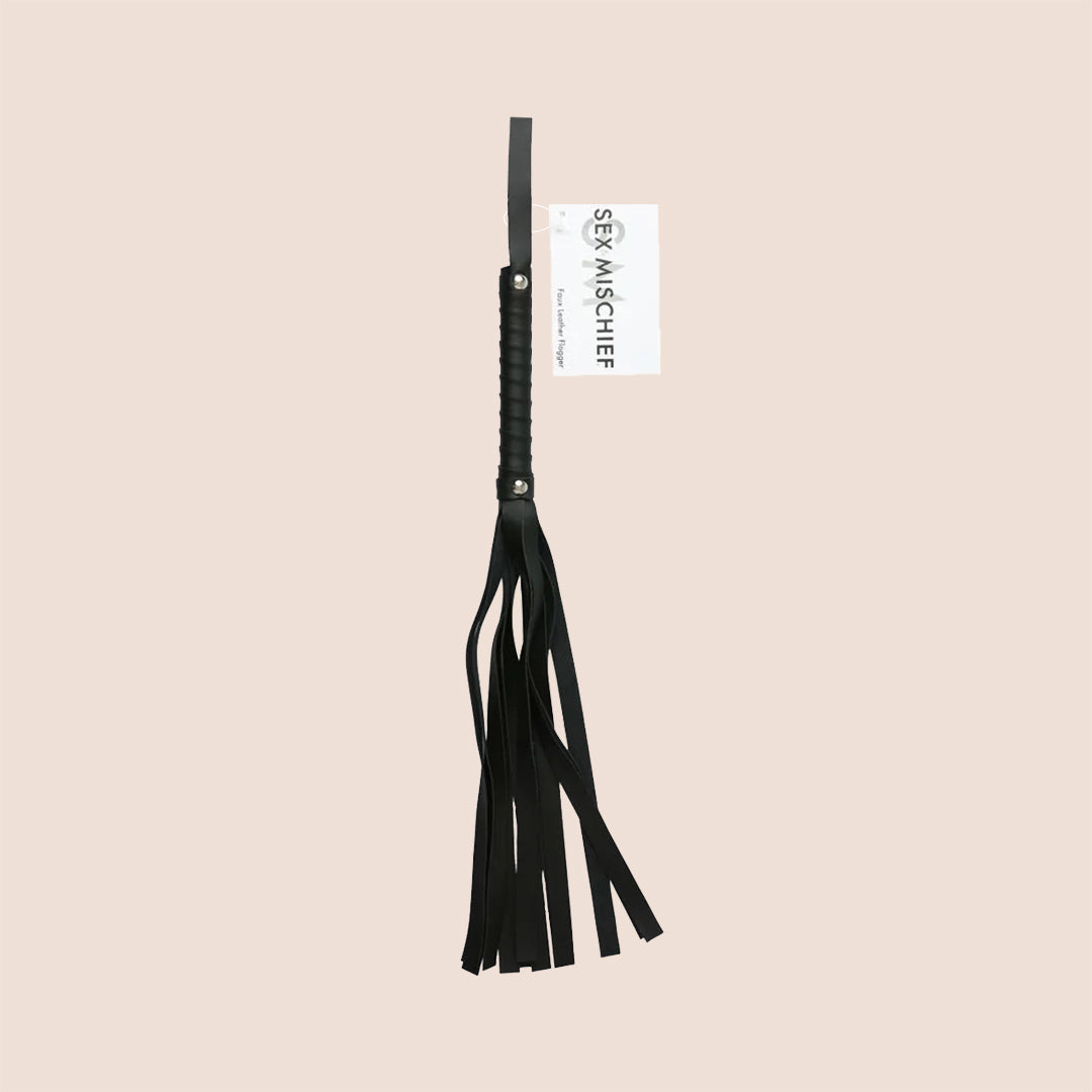 Sex & Mischief Faux Leather Flogger | vinyl