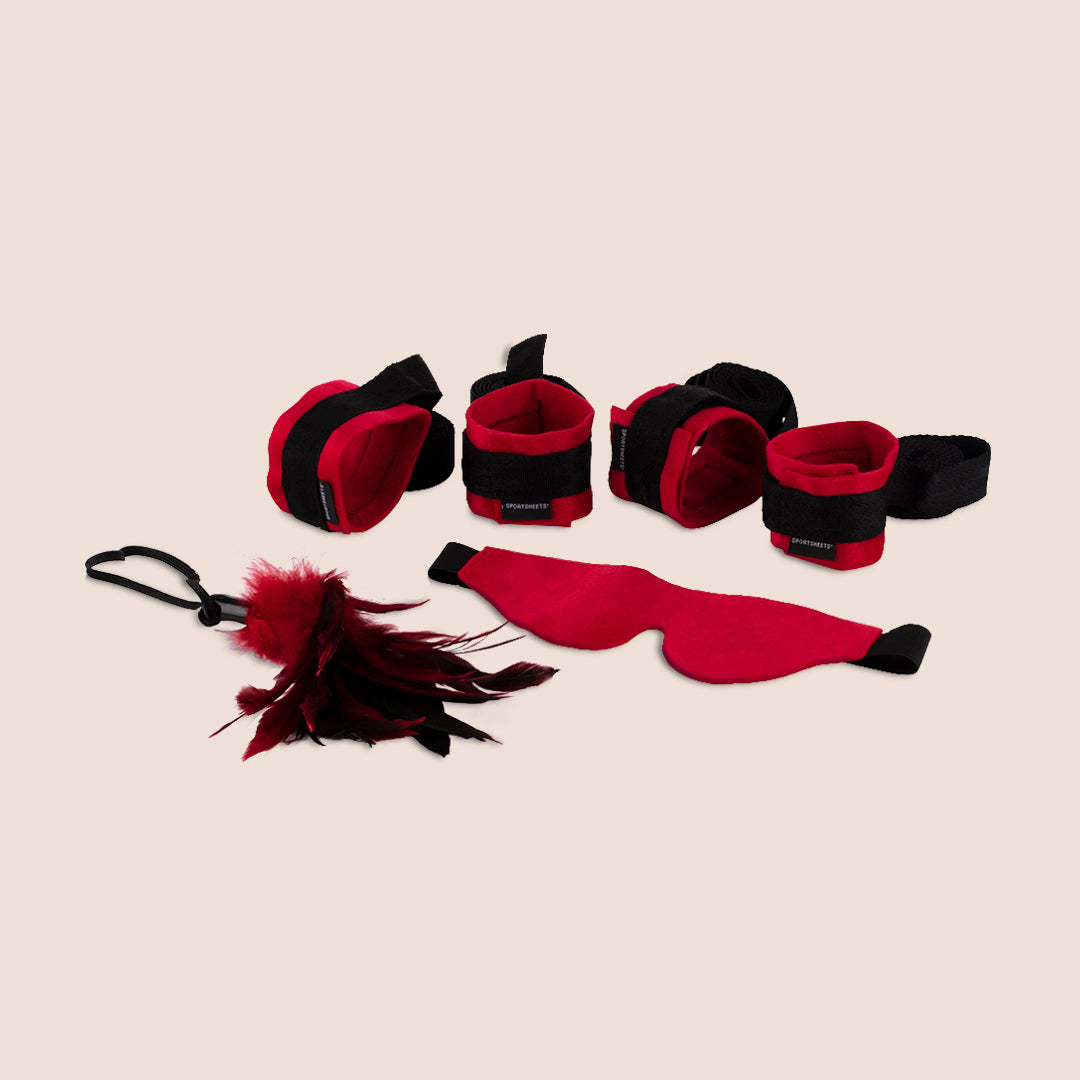 Sportsheets Sexy Submissive Kit | two sets of restraints, blindfold, feather tickler